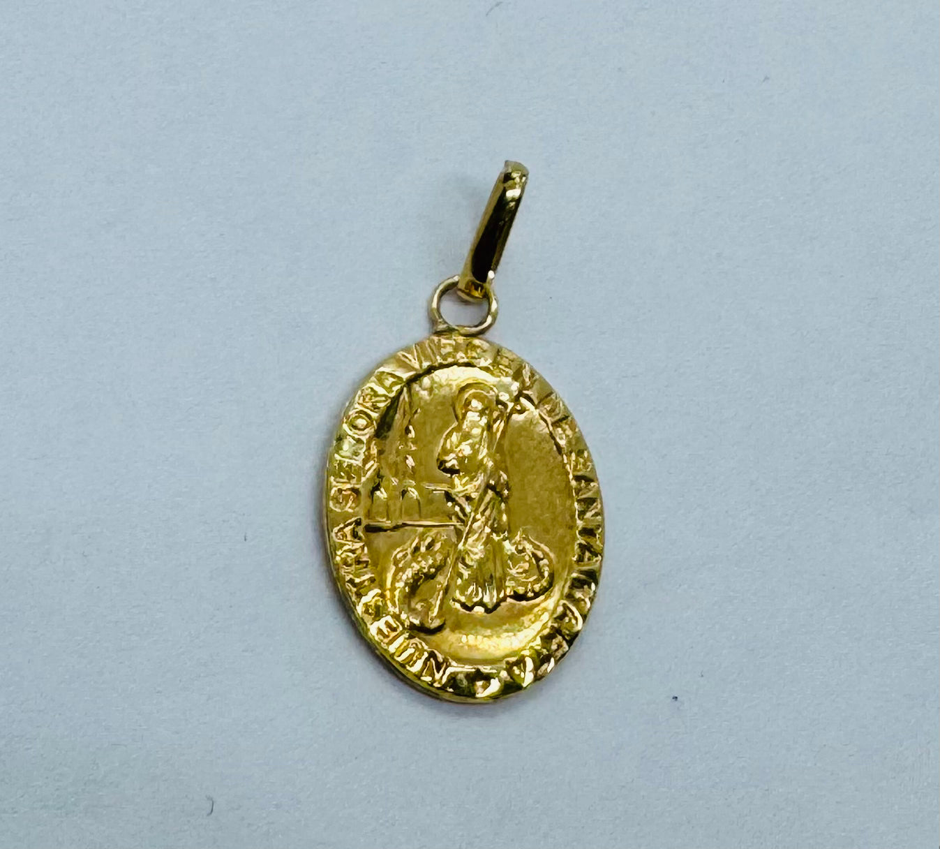 DIJE SANTA MARTA ORO AMARILLO 18K